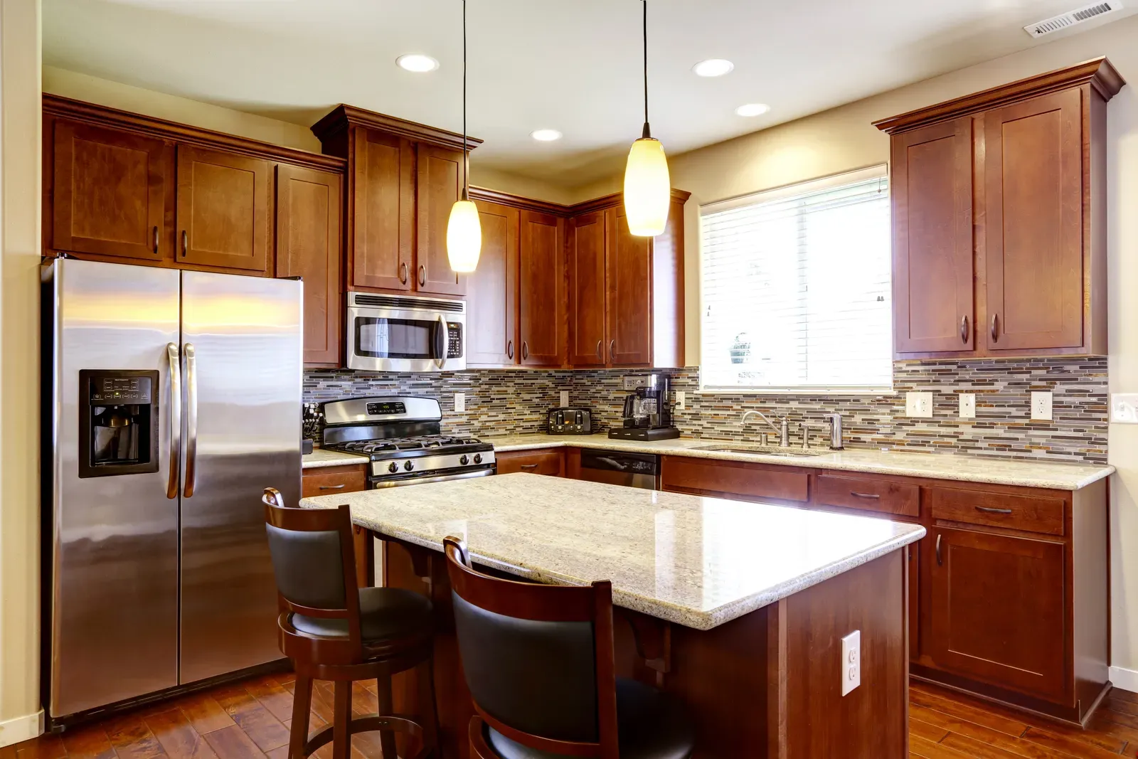 A kitchen with new materials being installed in the cabinets. | WP Kitchen Remodeling